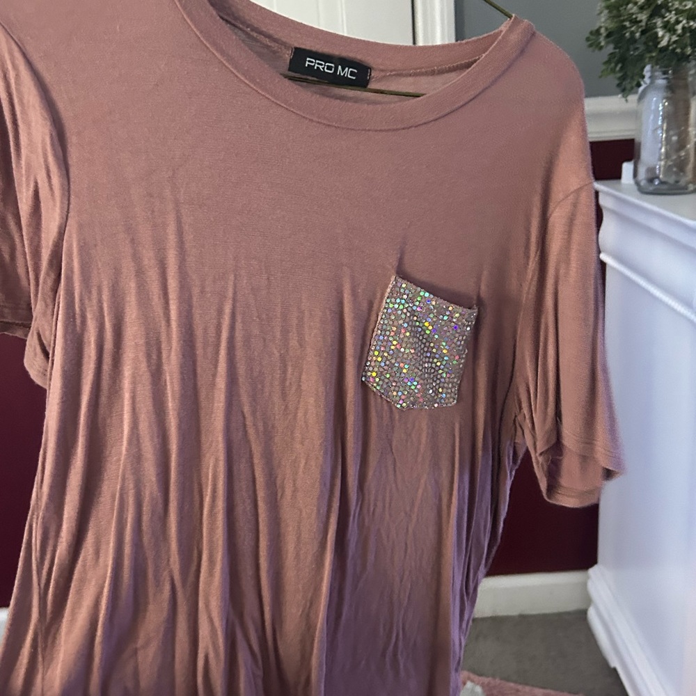 It’s a size small and I got it from a local boutique at a fair. Worn maybe twice